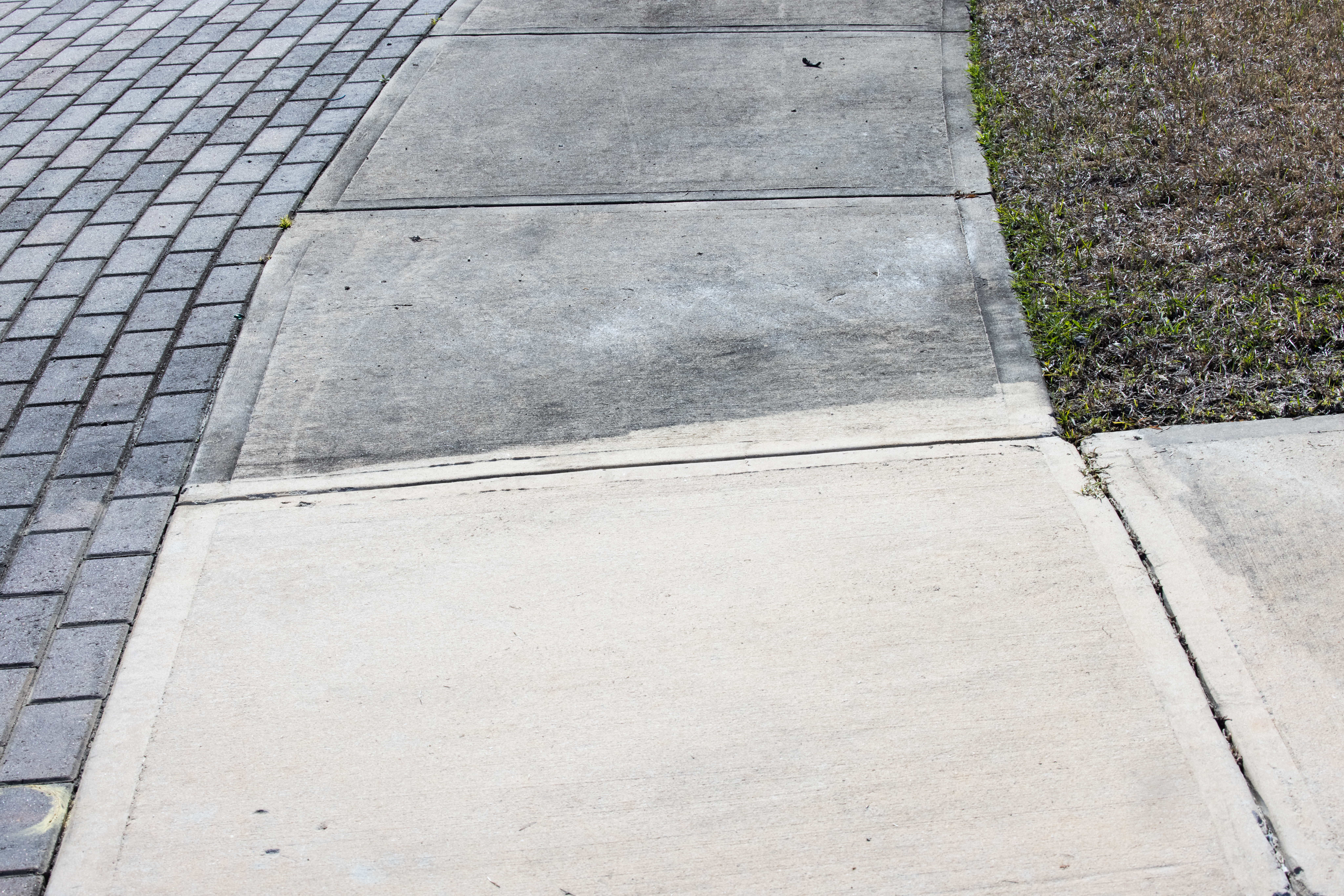 Featured image for “Winter Grime Be Gone: Pressure Washing for Driveways and Sidewalks”